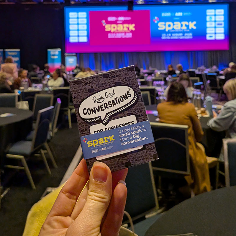 Spark Conference co-branded pack held up in venue